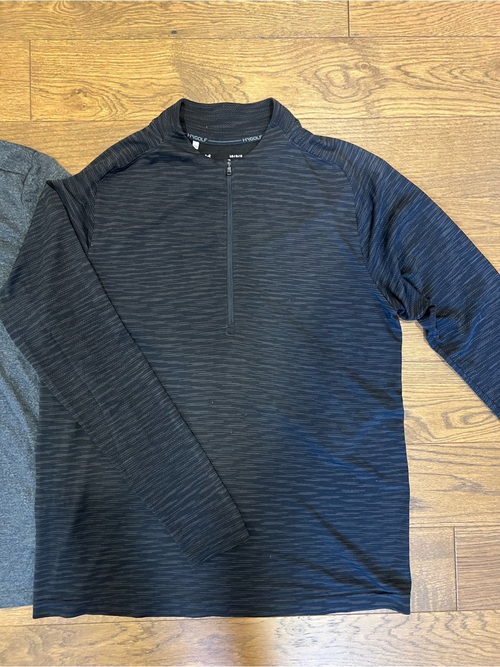 Set of two- men’s UA quarter zips